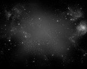 Vast black space with some fog and specks of stars and light.